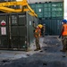 Sailors and Marines Offload EMF From USNS DAHL