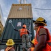 Sailors and Marines Offload EMF From USNS DAHL