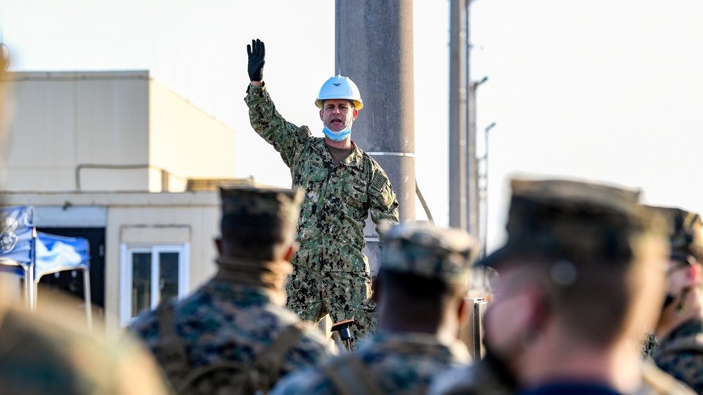 Sailors and Marines Offload EMF From USNS DAHL