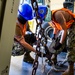 Sailors and Marines Offload EMF From USNS DAHL