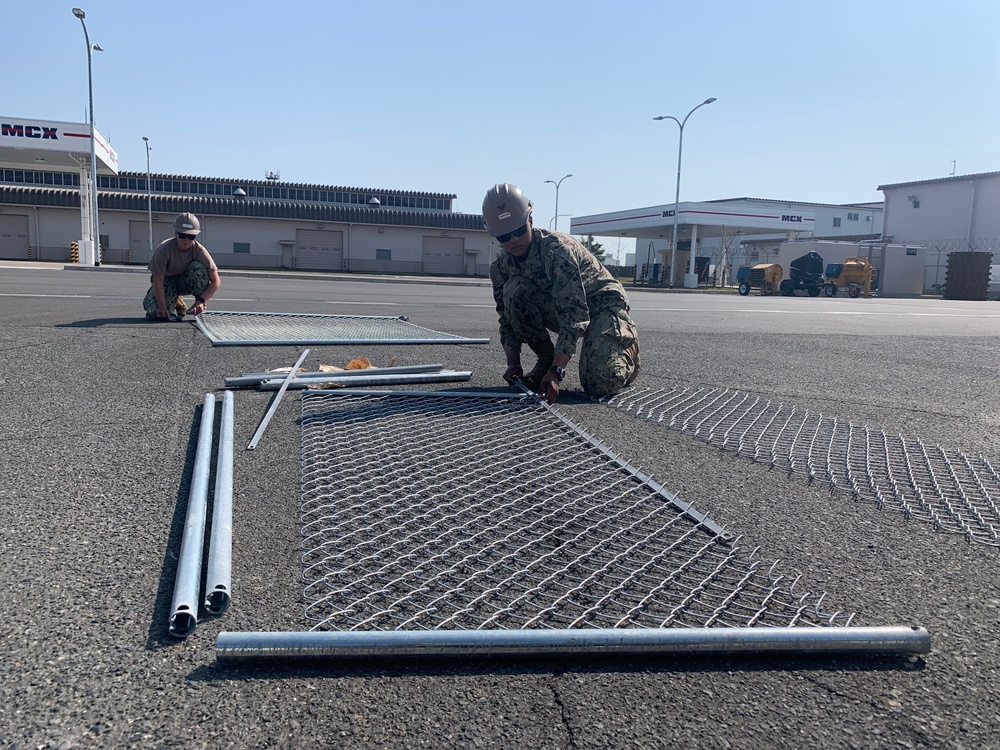 U.S. Navy Seabees deployed with NMCB-5’s Detail Iwakuni continue construction on environmental enclosures
