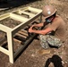 U.S. Navy Seabees with NMCB-5’s Detail Tinian build sinks for health care workers