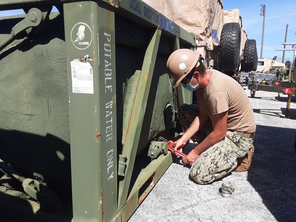 U.S. Navy Seabees with NMCB-5’s Detail Tinian prepare for projects