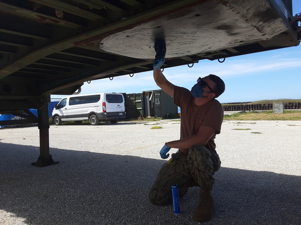 U.S. Navy Seabees with NMCB-5’s Detail Tinian prepare for projects