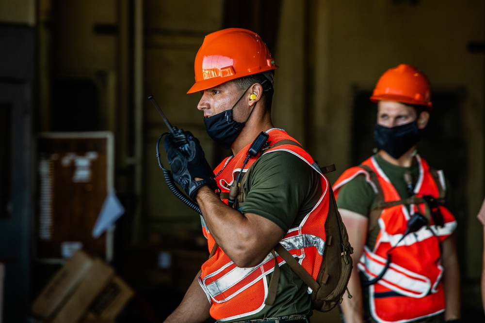 U.S. Marines and Sailors Offload EMF from USNS DAHL