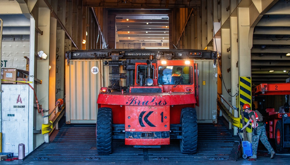U.S. Marines and Sailors Offload EMF from USNS DAHL