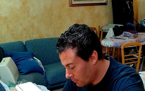 Local National employee sews protective masks for American workers at USAG Italy