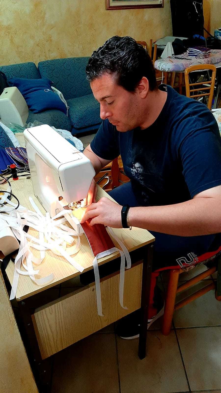 Local National employee sews protective masks for American workers at USAG Italy