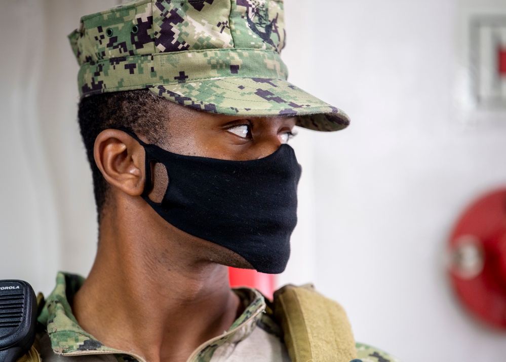 USNS Mercy Sailor Stands Watch