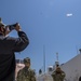 USNS Mercy Sailors Take Photos of Thank You Sign