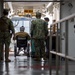 USNS Sailors Prepare to Disembark Patient