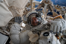 Army astronaut repairs Alpha Magnetic Spectrometer on ISS