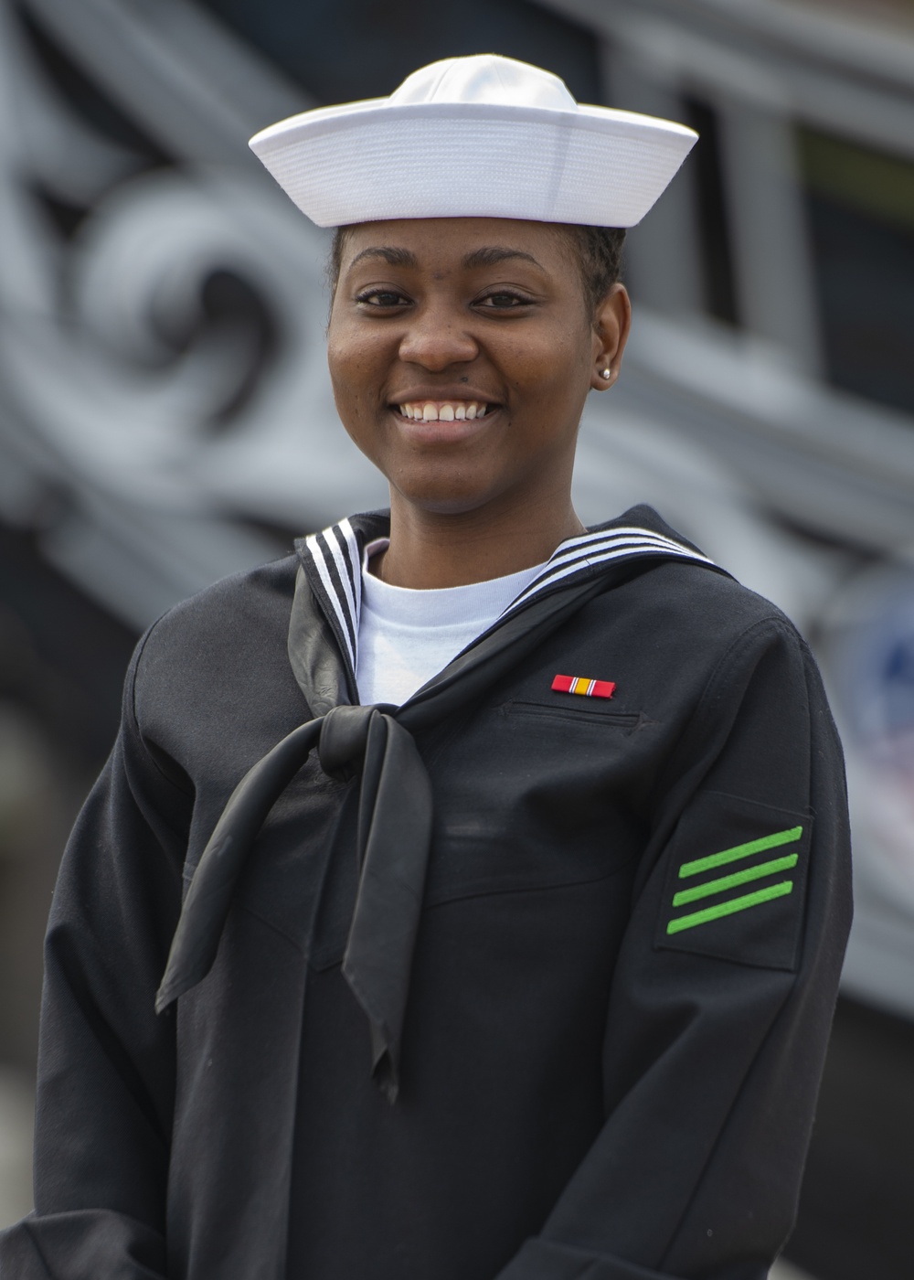 Aviation Structural Mechanic Seaman Chantol Kelly Checks Aboard USS Constitution