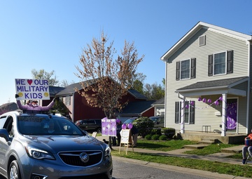 Teachers parade through Fort Knox neighborhoods on Purple Up Day to encourage military students