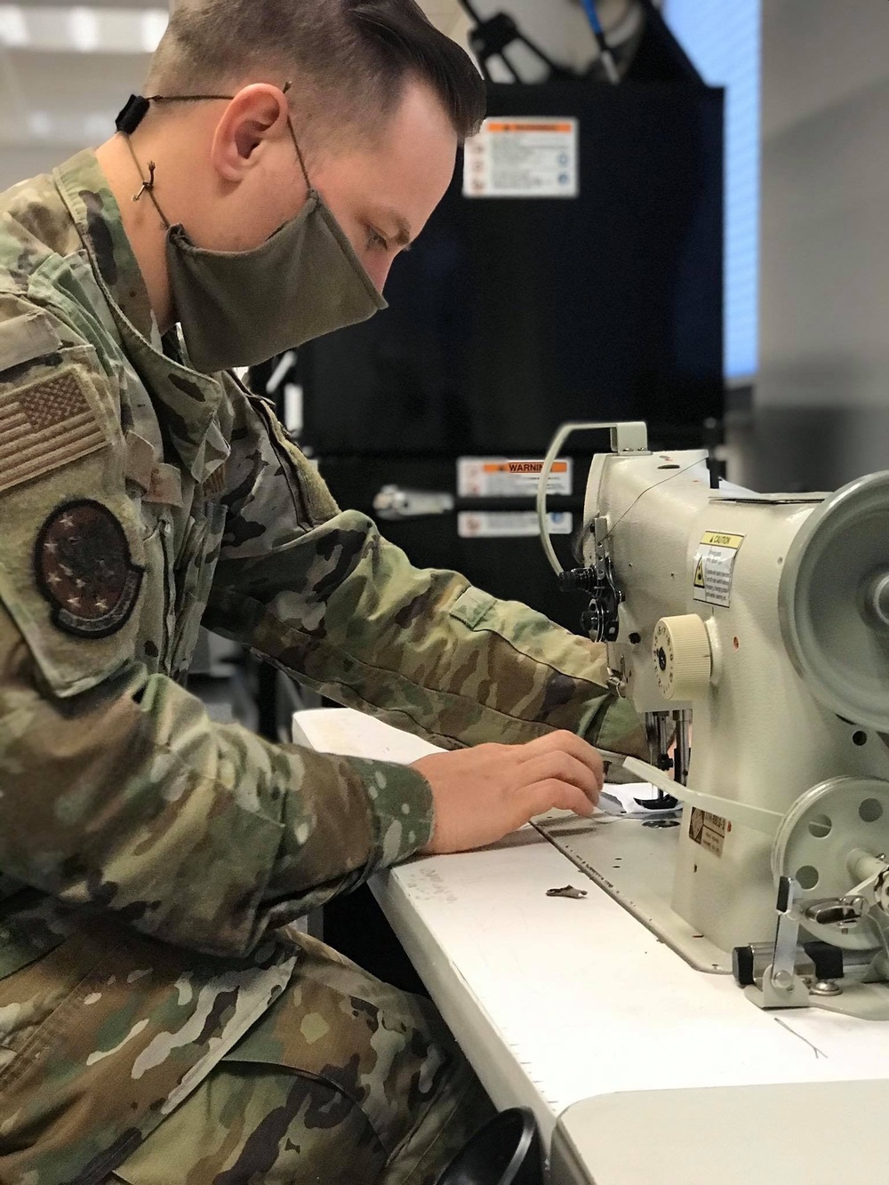 52nd OSS Airmen help combat COVID-19 with mass production of face masks