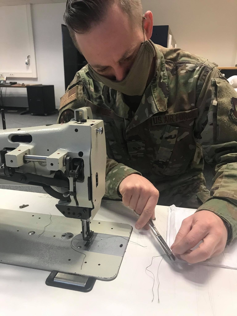 52nd OSS Airmen help combat COVID-19 with mass production of face masks