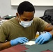 Aerial Delivery instructors, students make face coverings, surgical masks