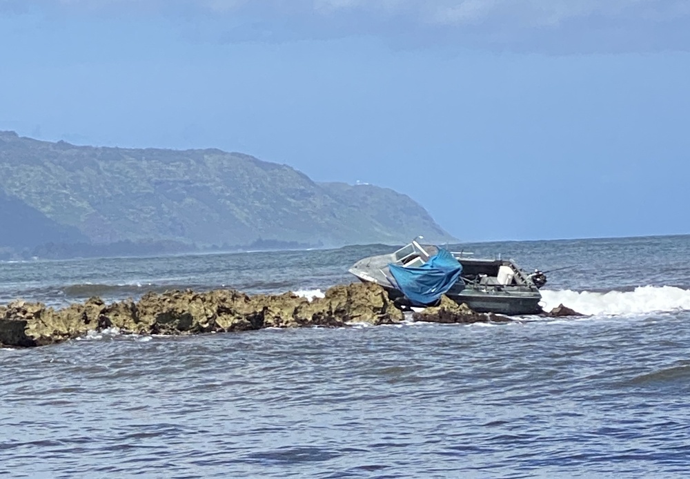 Coast Guard, HFD, HPD respond to grounded vessel off Haleiwa Harbor