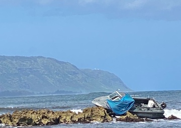 Coast Guard, HFD, HPD respond to grounded vessel off Haleiwa Harbor