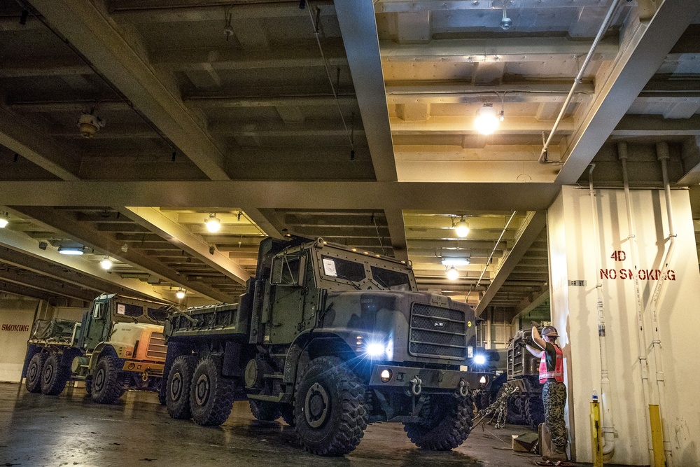 Marines with 3rd MLG Rearrange Heavy Equipment aboard USNS Dahl