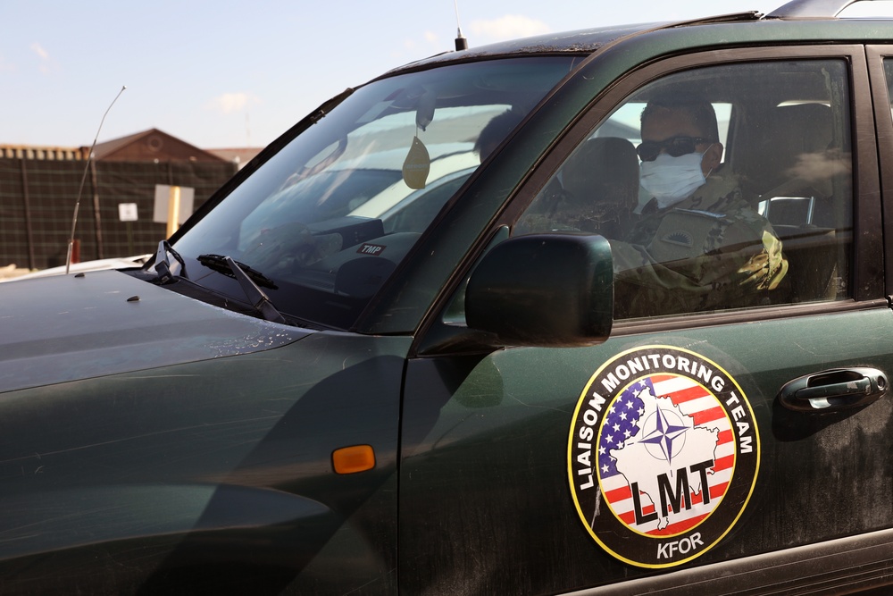 KFOR Liaison Monitoring Team practices preventative measures during patrol