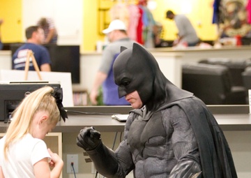 Title: “Cause-play”: Dogface Soldier suits up as Batman to give back to community