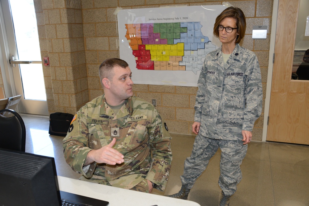 Sgt. First Class Anthony Fravel talks with Lt. Colonel Debbie Jacobsmeier