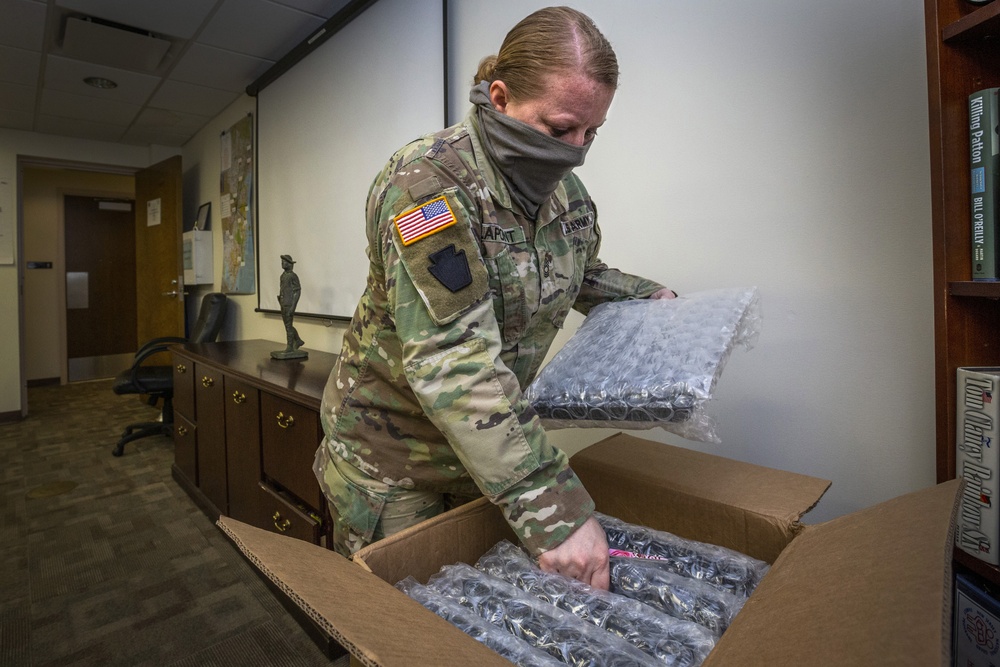 Donated computers support children of frontline Guardsmen