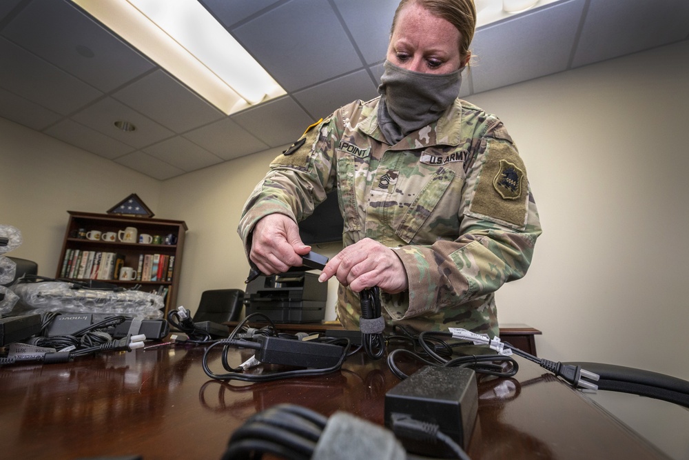 Donated computers support children of frontline Guardsmen