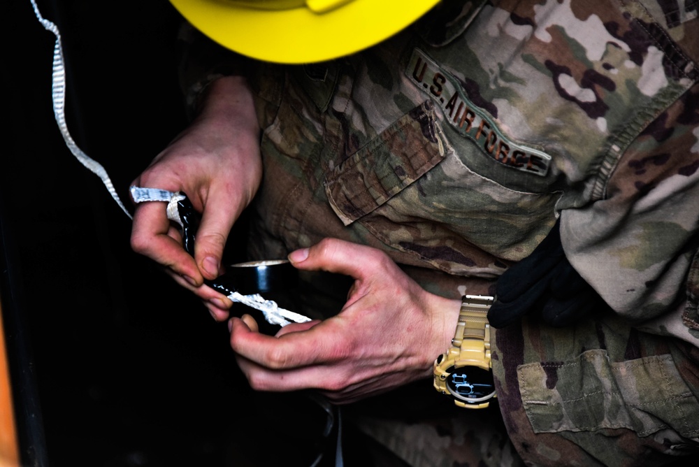 241st Engineering Installation Squadron installs fiber optic cable at McGhee Tyson Air National Guard Base