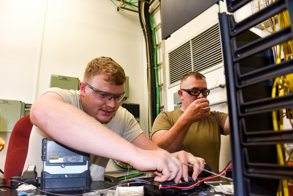 241st Engineering Installation Squadron installs fiber optic cable at McGhee Tyson Air National Guard Base