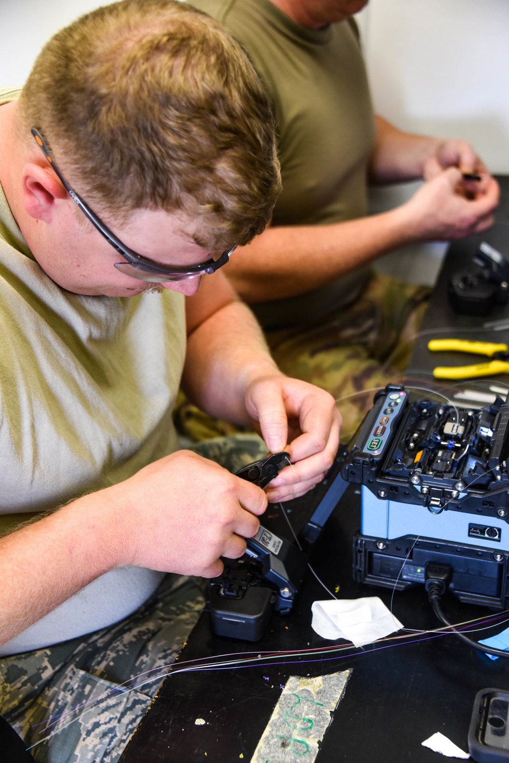 241st Engineering Installation Squadron installs fiber optic cable at McGhee Tyson Air National Guard Base