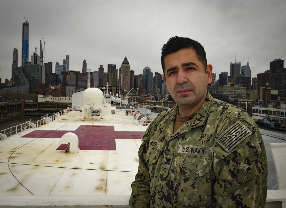 Hospital Corpsman 2nd Class Lester Miller, a biomedical repair technician from Queens, New York City, currently serving onboard the Military Sealift Command hospital ship USNS Comfort (T-AH 20) Comfort
