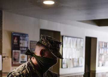 MCAGCC Headquarters Battalion Marine disinfects to combat COVID
