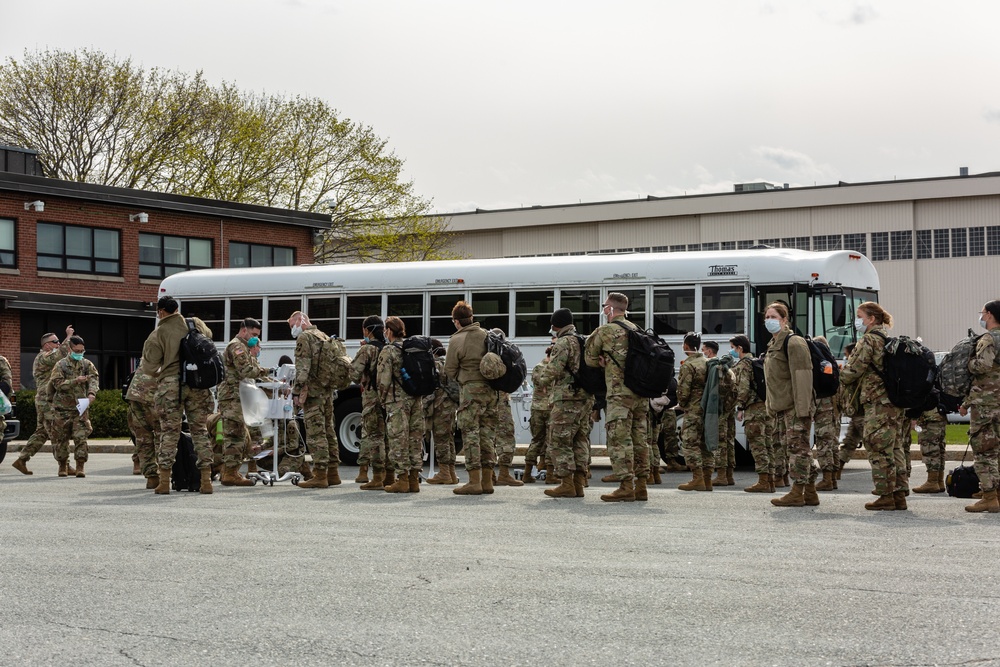 Soldiers with the 94th CSH arrive at Hanscom