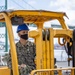 USNS Mercy Sailor Operates Forklift