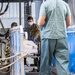 USNS Mercy Sailors Transport Patient