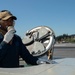Nimitz Sailor Communicates To Panel On Flight Deck