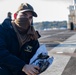 Nimitz Sailor Cleans Cover Plate