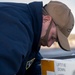 Nimitz Sailor Installs Bolts Onto Tow Tractor