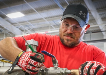 Headline: NSWC IHEODTD, McAlester Detachment assemble fuel valves