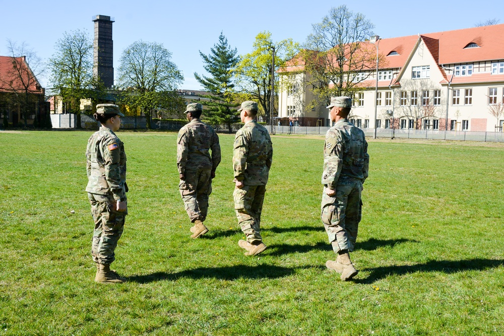 1ID Fwd Soldiers participate in marching drills during remote BLC course in Poland