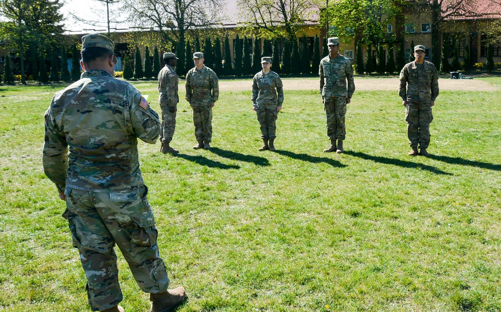 1ID Fwd Soldiers participate in marching drills during remote BLC course in Poland
