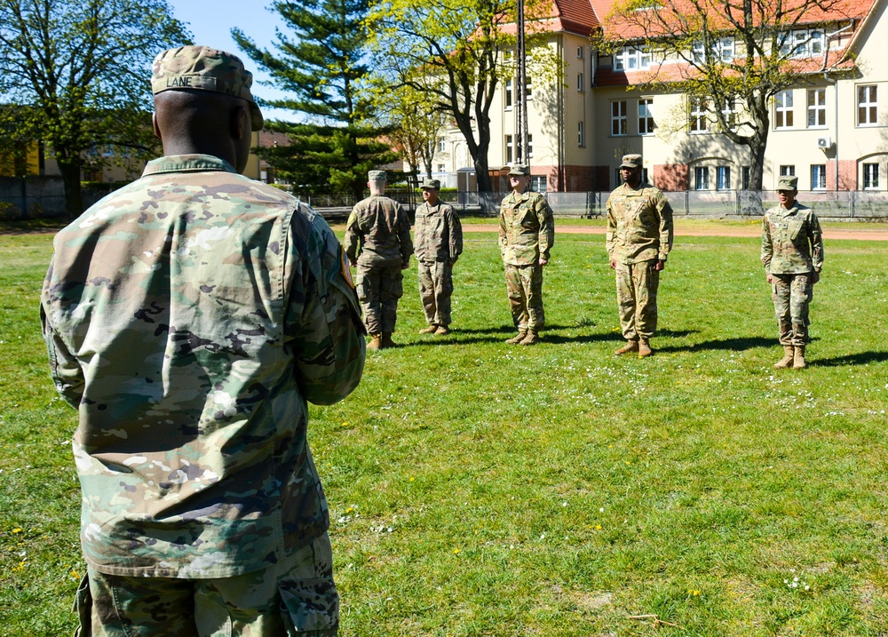 1ID Fwd Soldiers participate in marching drills during remote BLC course in Poland