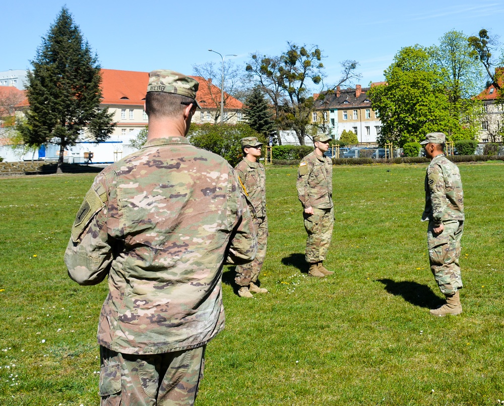 1ID Fwd Soldiers participate in marching drills during remote BLC course in Poland