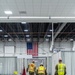 Michigan National Guard members place beds at COVID-19 alternate care facility