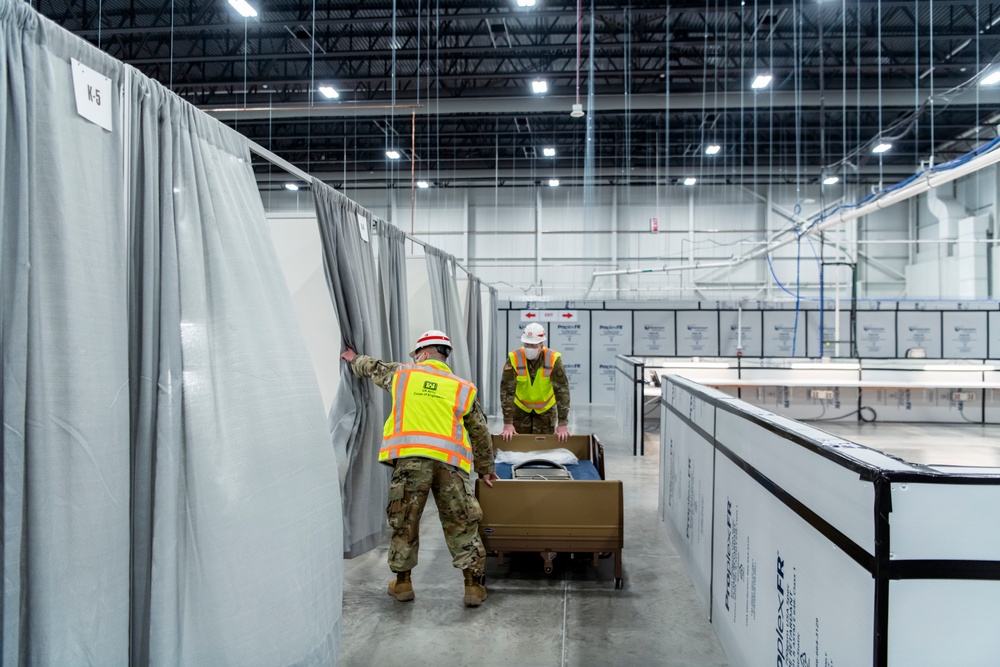 Michigan National Guard members place beds at COVID-19 alternate care facility