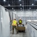 Michigan National Guard members place beds at COVID-19 alternate care facility