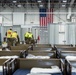 Michigan National Guard members place beds at COVID-19 alternate care facility