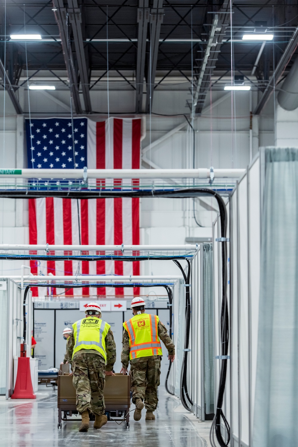 Michigan National Guard members place beds at COVID-19 alternate care facility